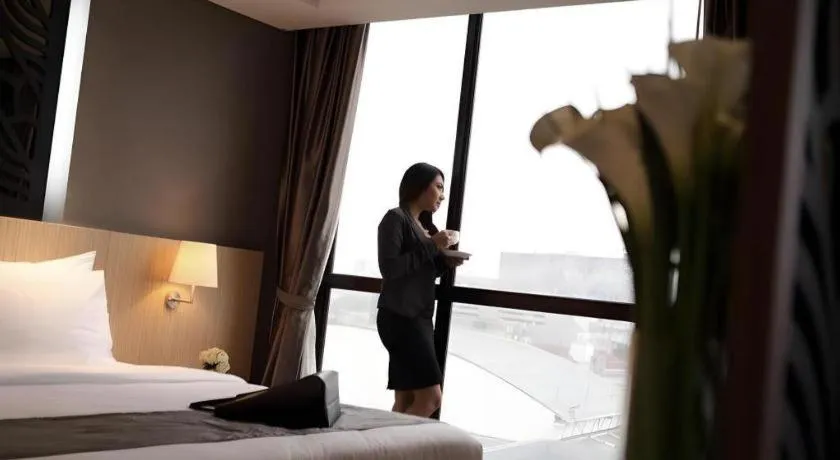 Bed in Hotel Grandhika Pemuda