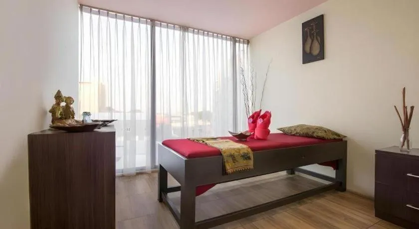 Bed in Hotel Grandhika Pemuda