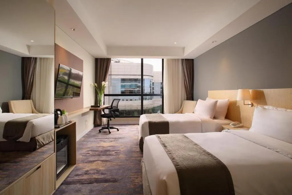 Bed in Hotel Grandhika Pemuda