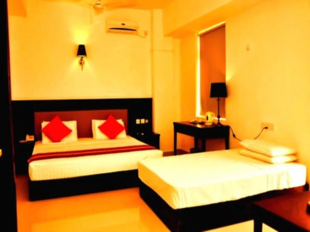 Bed in Sai Sea City Hotel