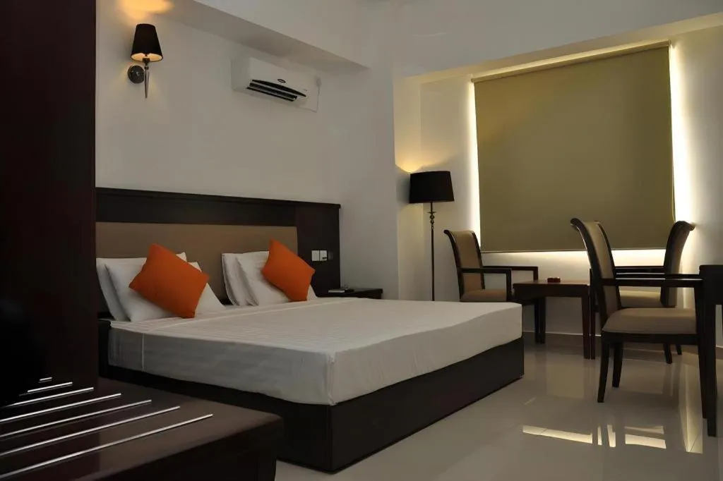 Bed in Sai Sea City Hotel