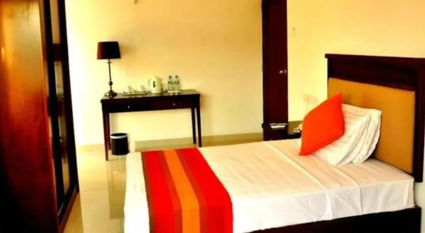 Bed in Sai Sea City Hotel