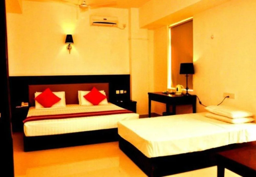 Bed in Sai Sea City Hotel