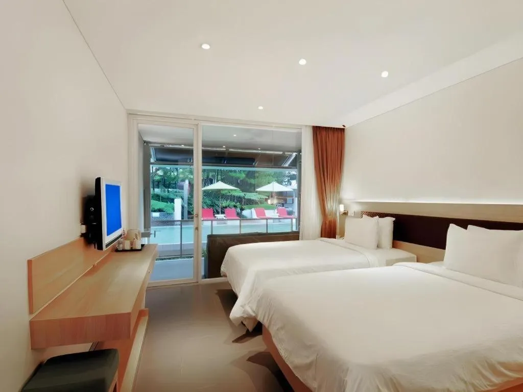 Bed in Bumi Bandhawa Hotel