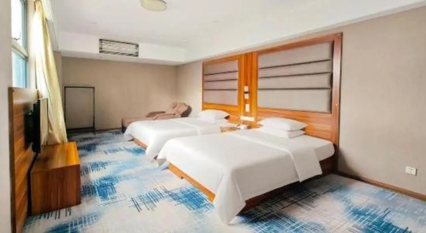 Bed in Chuanghui Business Hotel