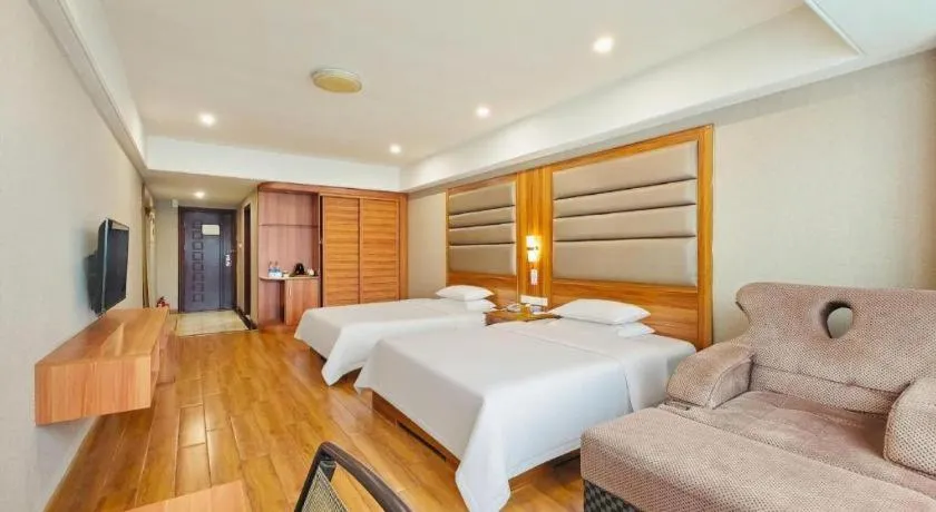 Bed in Chuanghui Business Hotel