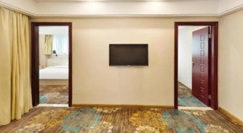 Bed in Chuanghui Business Hotel