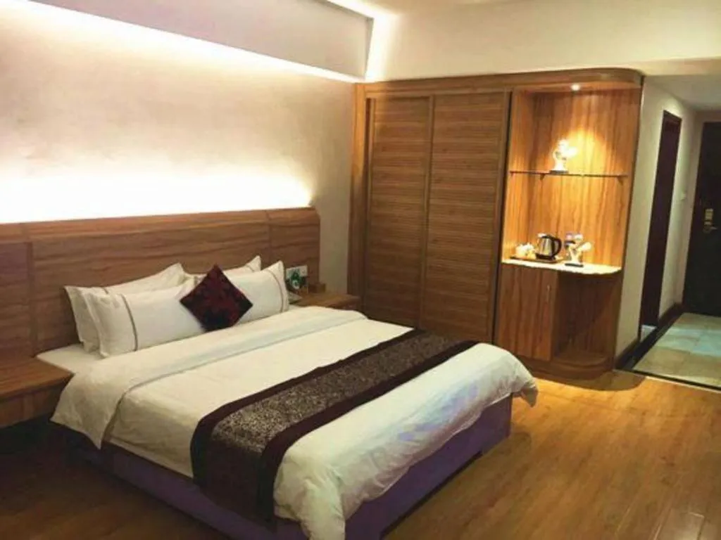 Bed in Chuanghui Business Hotel