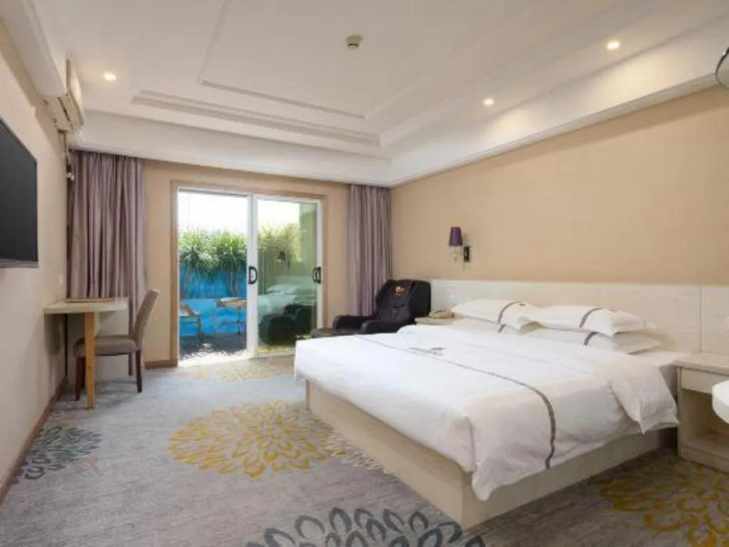 Bed in Chuanghui Business Hotel