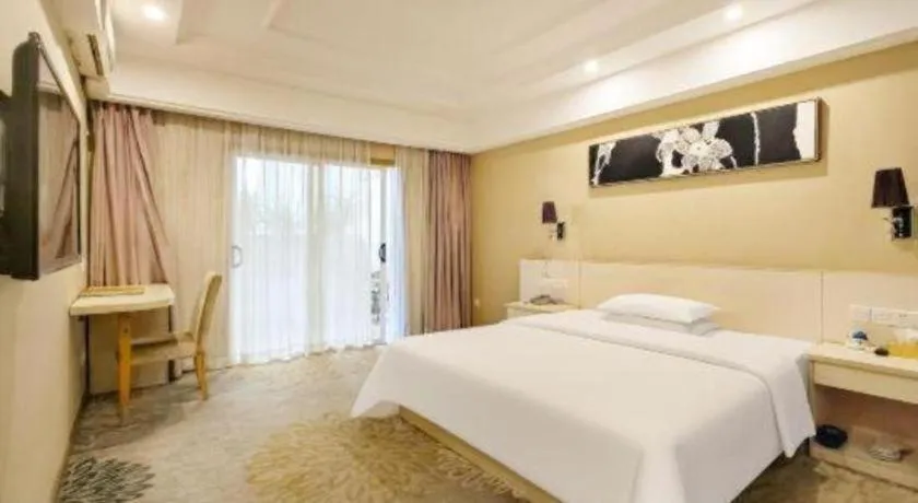 Bed in Chuanghui Business Hotel