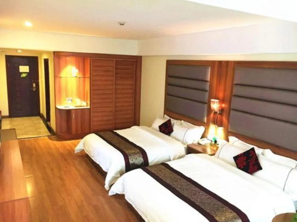 Bed in Chuanghui Business Hotel