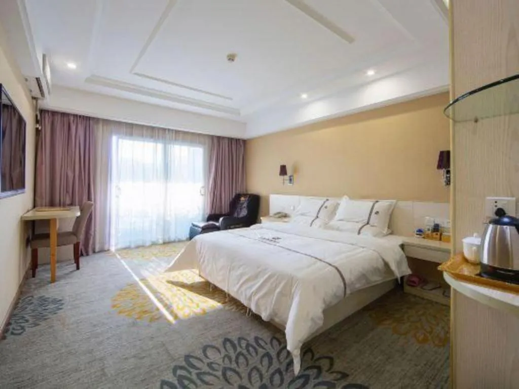 Bed in Chuanghui Business Hotel