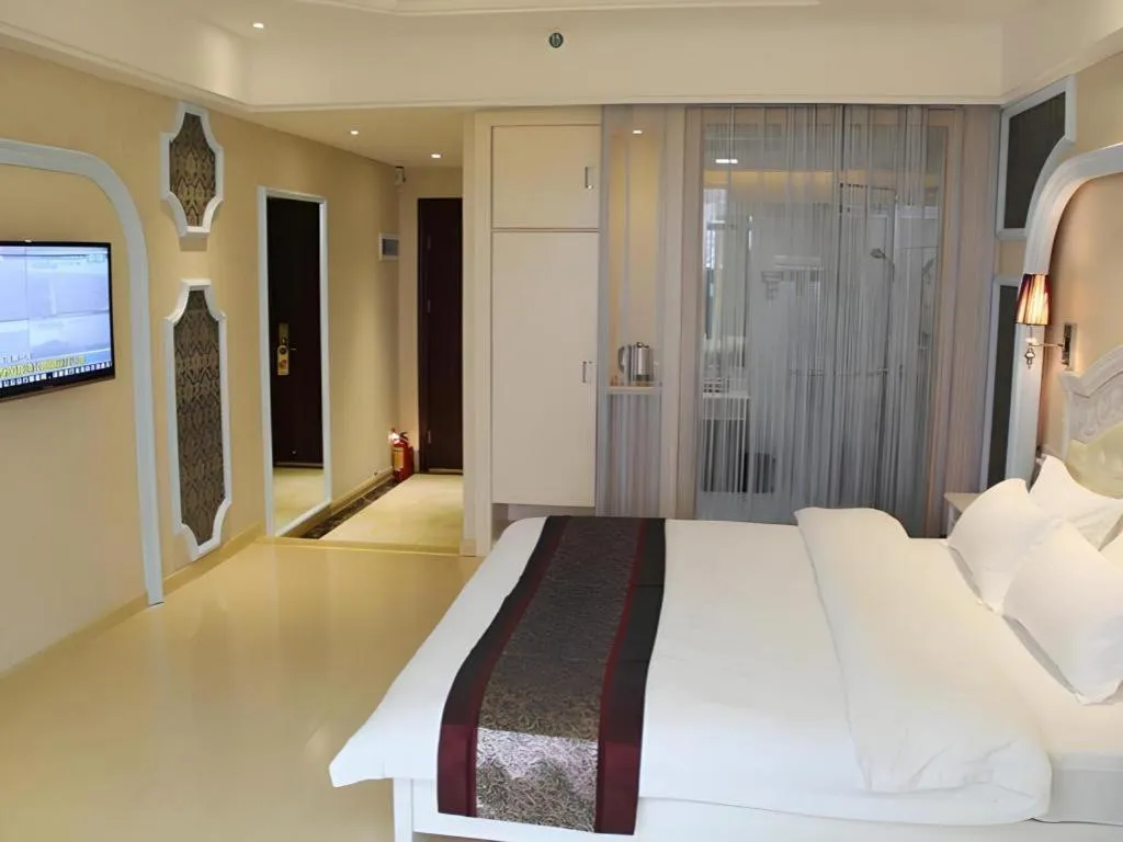 Bed in Chuanghui Business Hotel