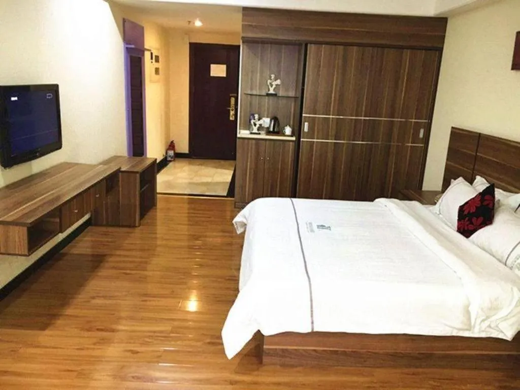 Bed in Chuanghui Business Hotel
