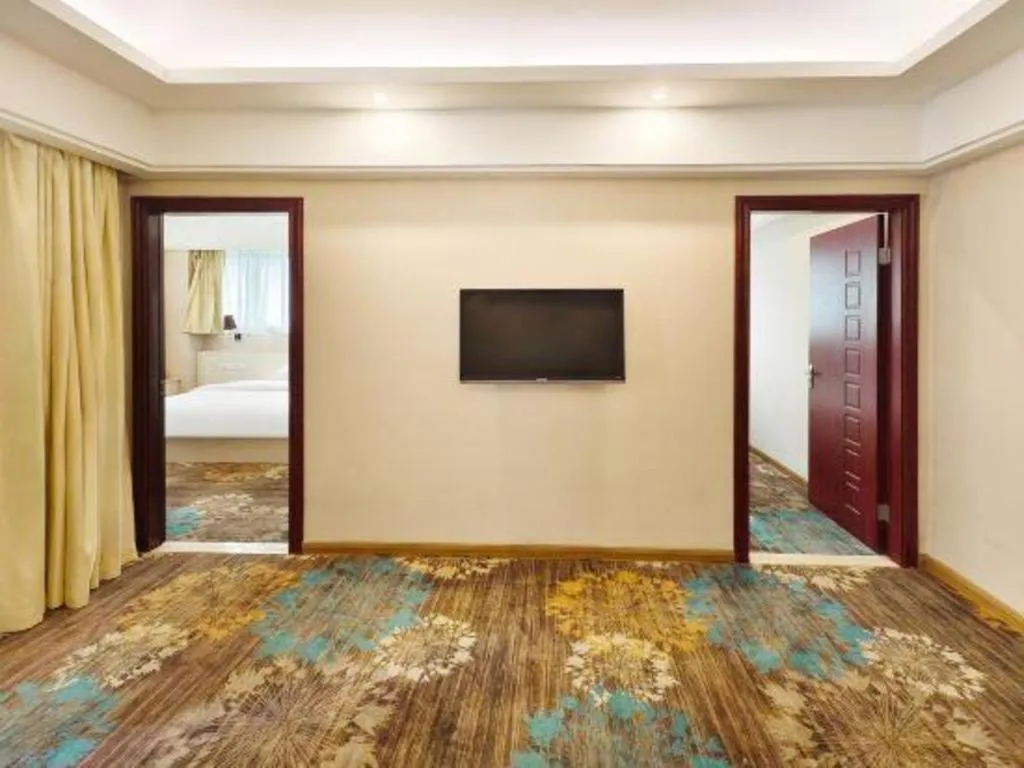 Bed in Chuanghui Business Hotel