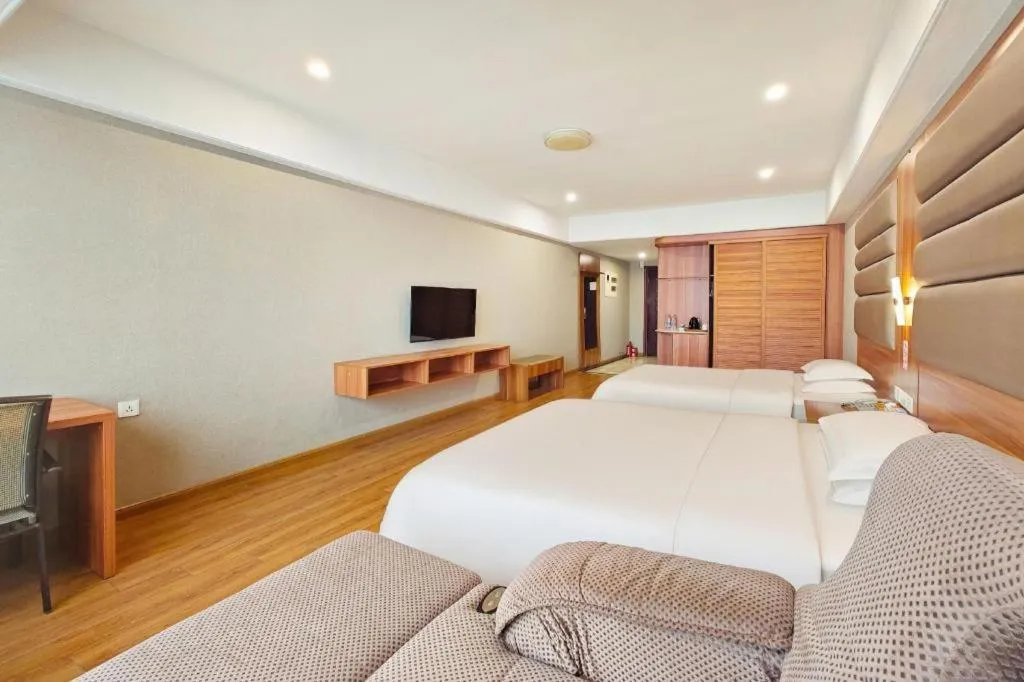 Bed in Chuanghui Business Hotel