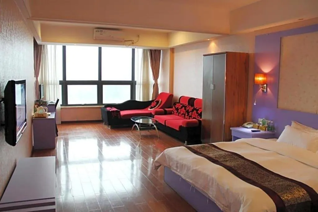 Bed in Chuanghui Business Hotel