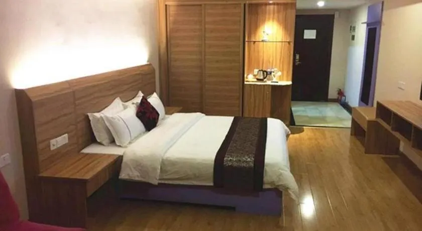 Bed in Chuanghui Business Hotel