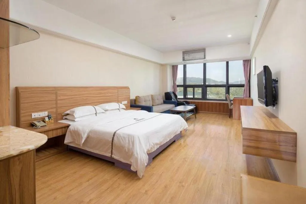 Bed in Chuanghui Business Hotel