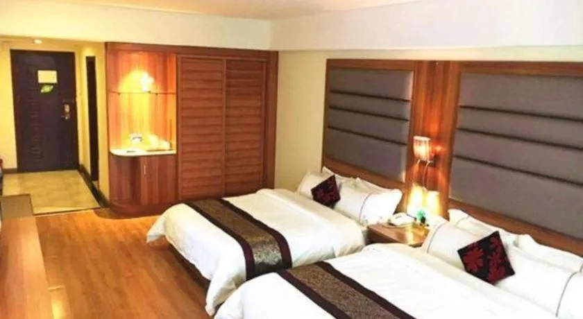 Bed in Chuanghui Business Hotel