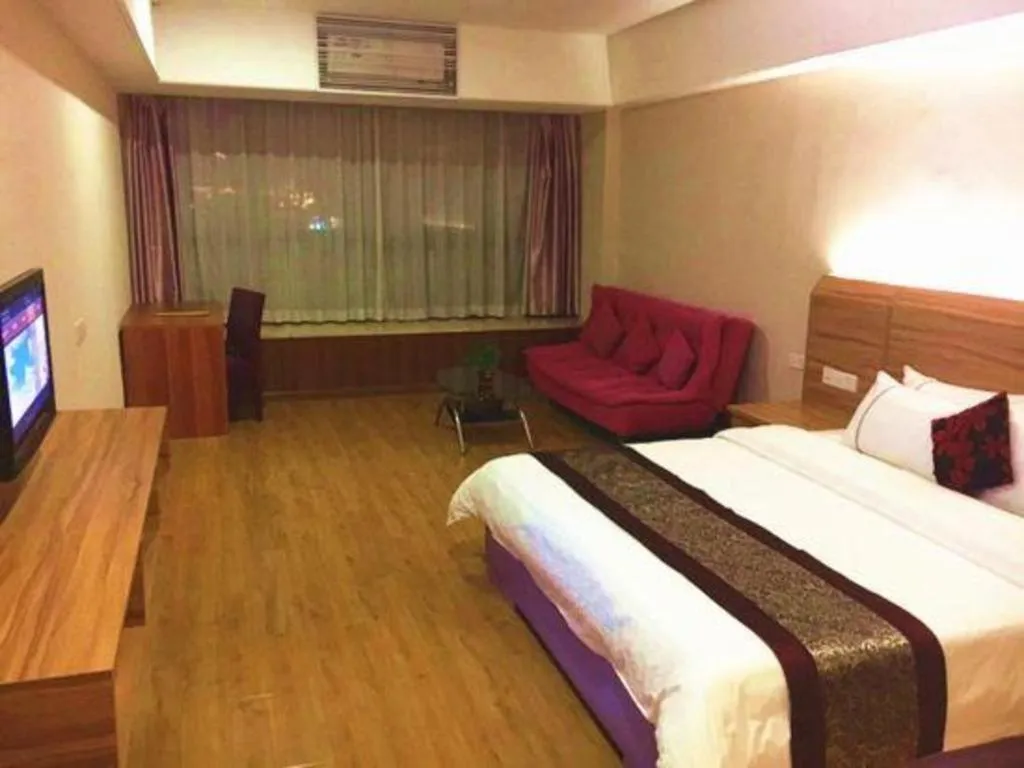 Bed in Chuanghui Business Hotel