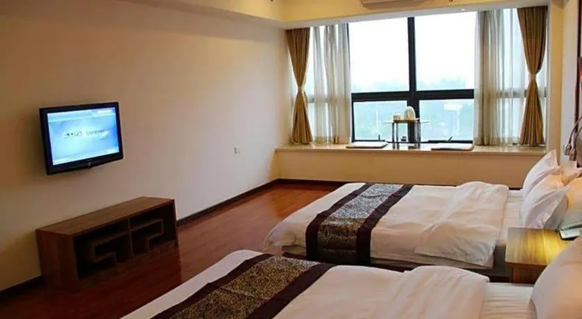 Bed in Chuanghui Business Hotel