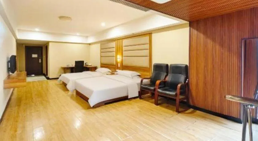 Bed in Chuanghui Business Hotel
