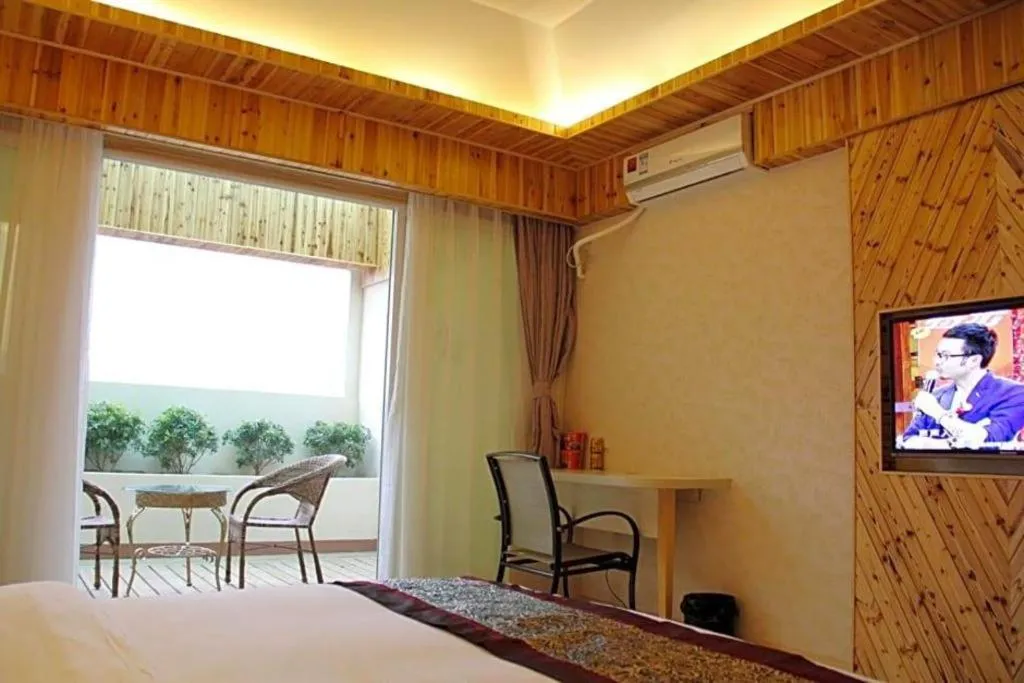 Bed in Chuanghui Business Hotel