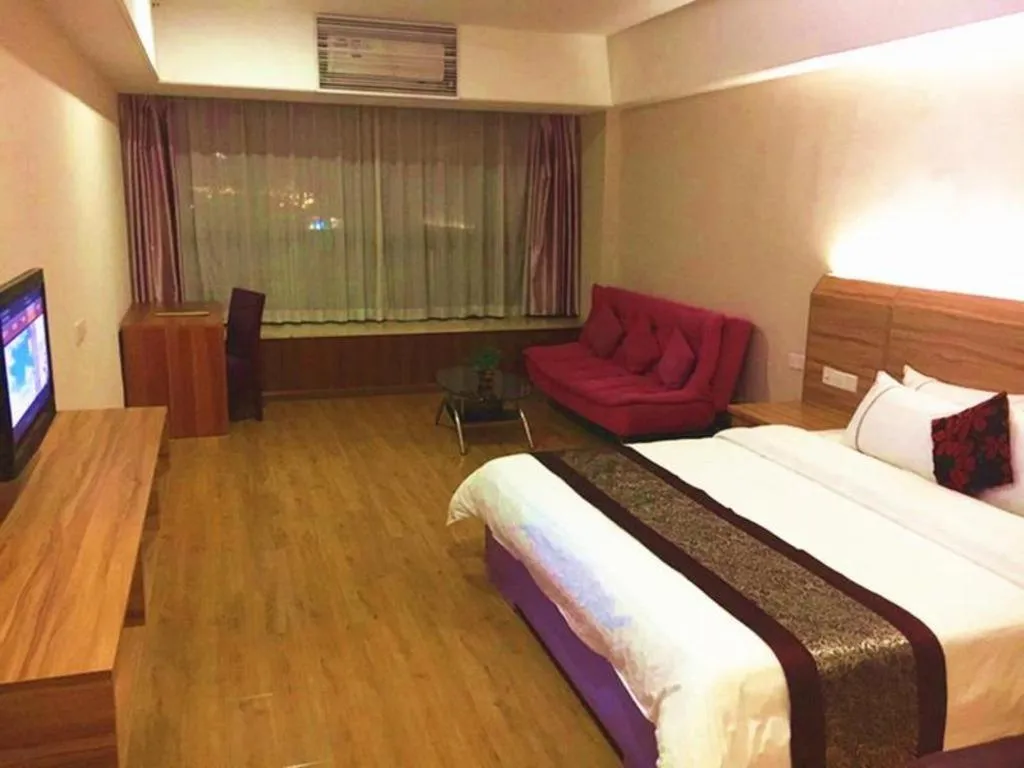 Bed in Chuanghui Business Hotel