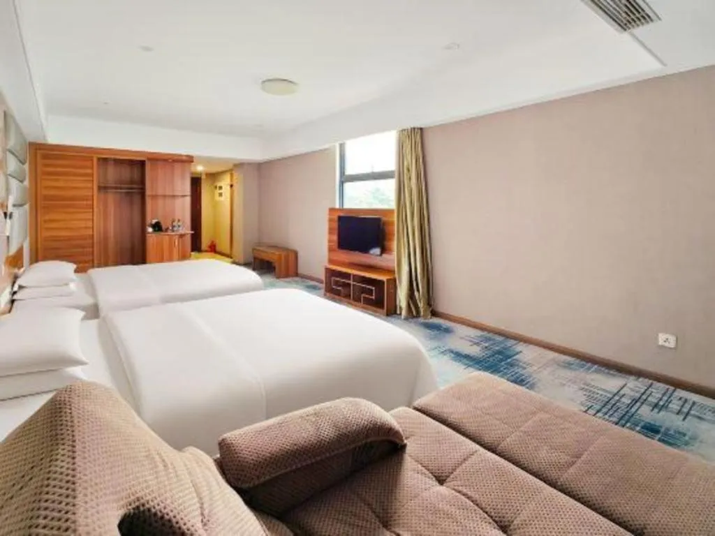 Bed in Chuanghui Business Hotel