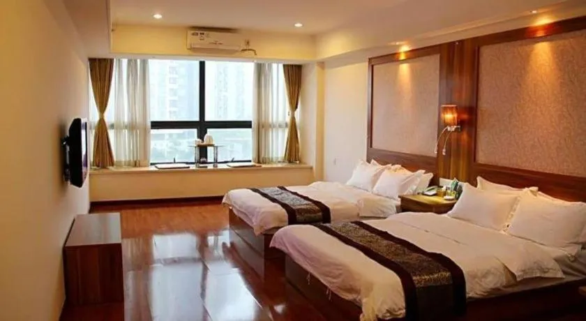 Bed in Chuanghui Business Hotel