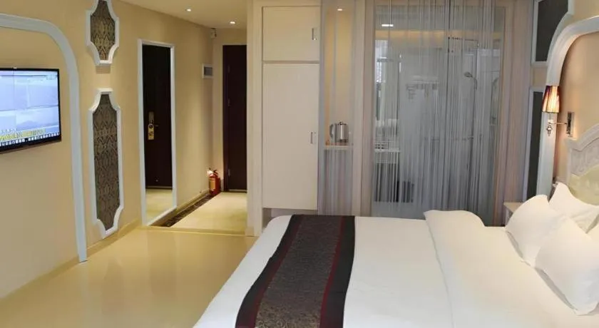 Bed in Chuanghui Business Hotel