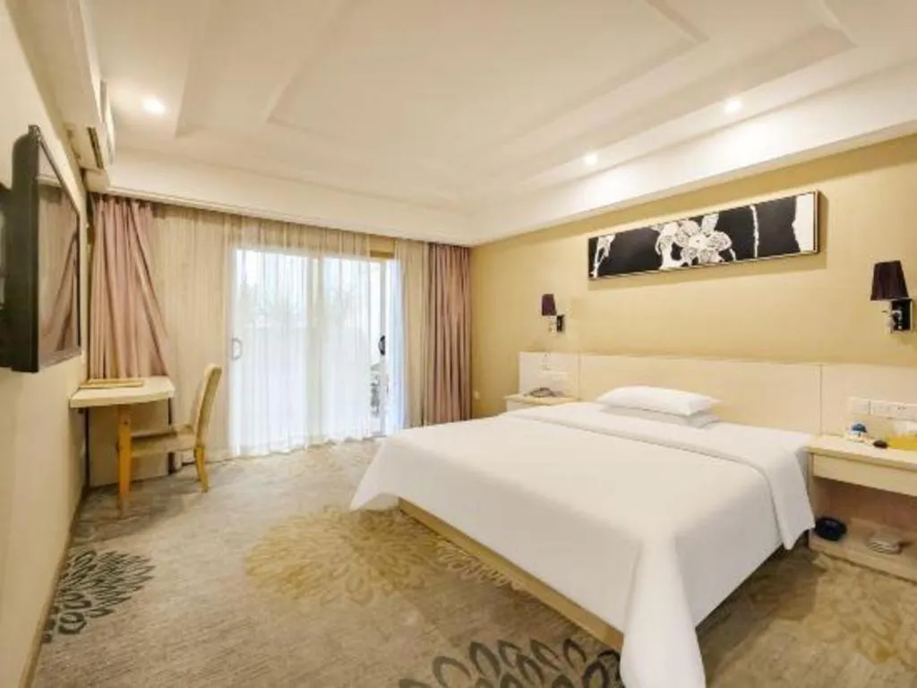 Bed in Chuanghui Business Hotel