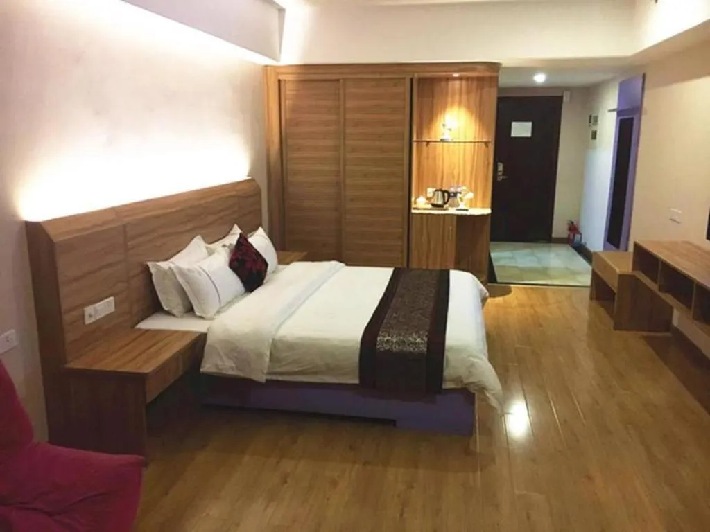 Bed in Chuanghui Business Hotel