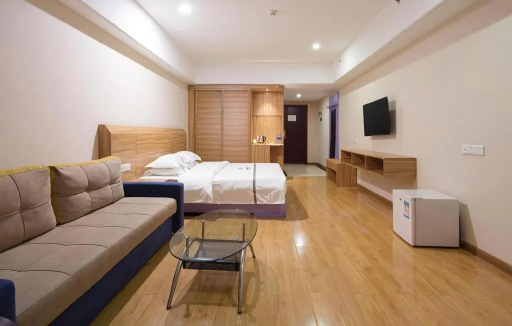 Bed in Chuanghui Business Hotel