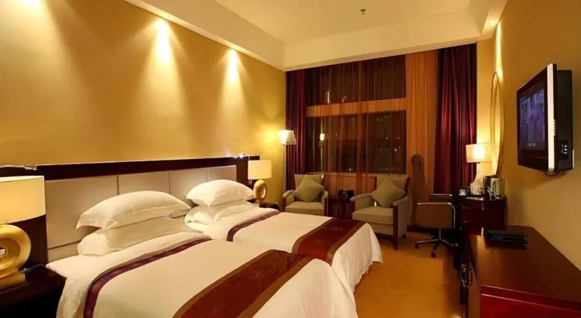 Bed in Chuanghui Business Hotel