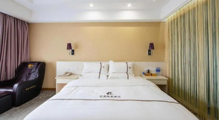 Bed in Chuanghui Business Hotel