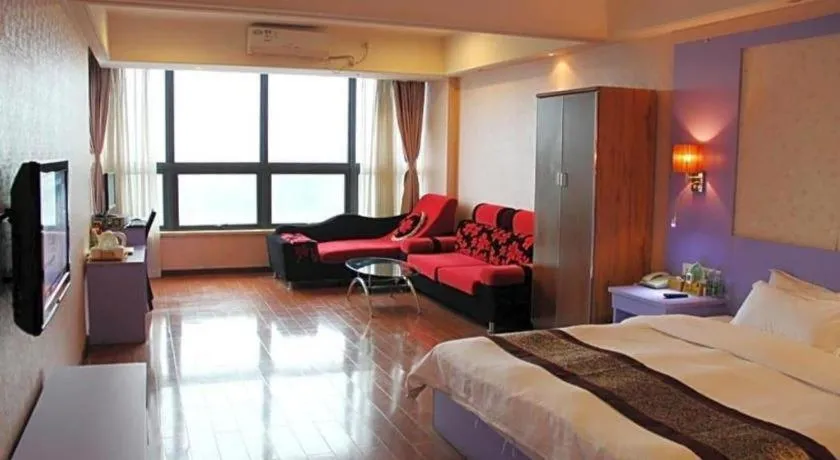 Bed in Chuanghui Business Hotel