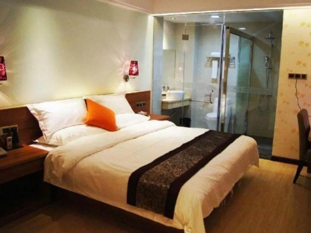 Bed in Chuanghui Business Hotel