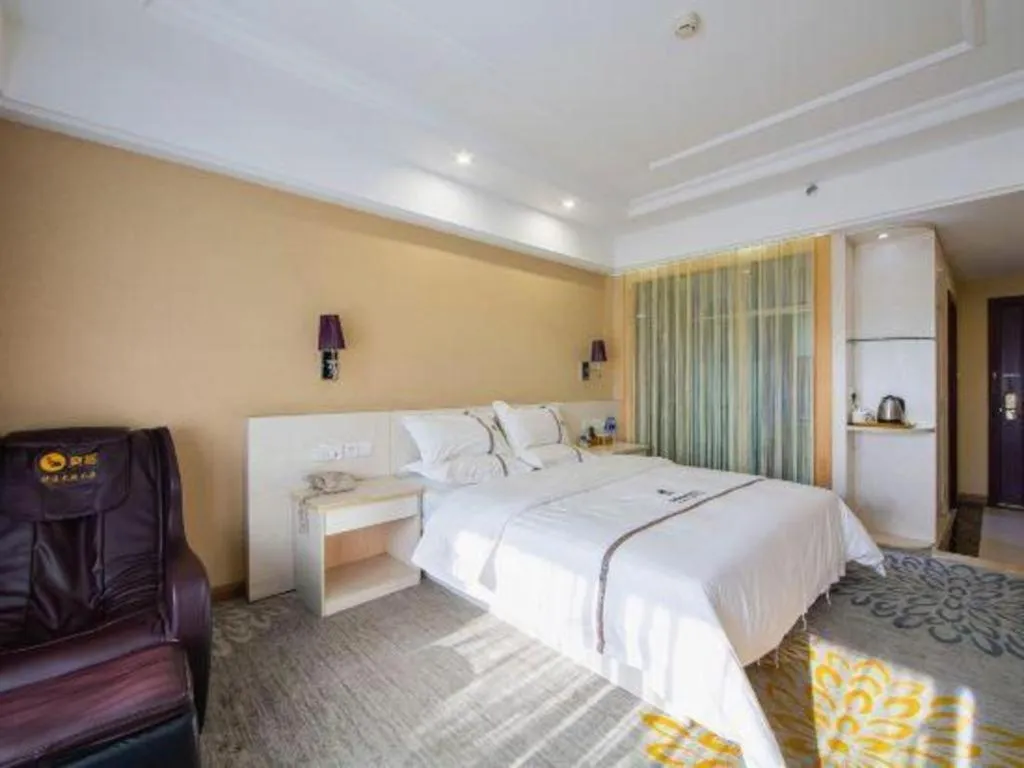 Bed in Chuanghui Business Hotel