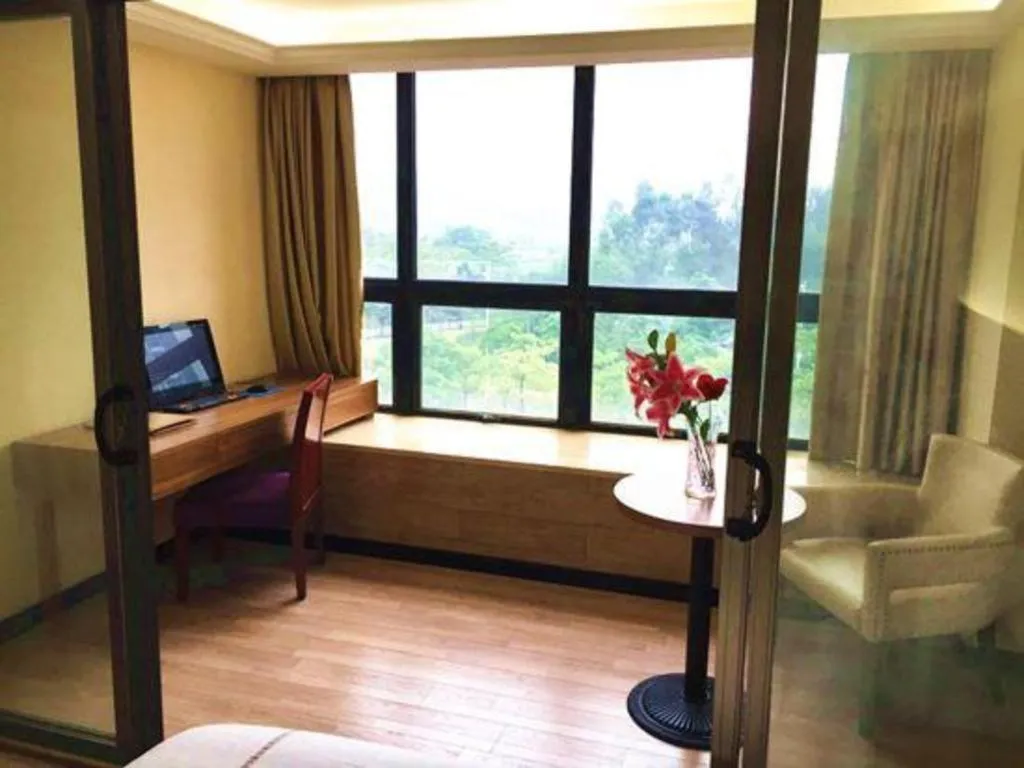 Bed in Chuanghui Business Hotel