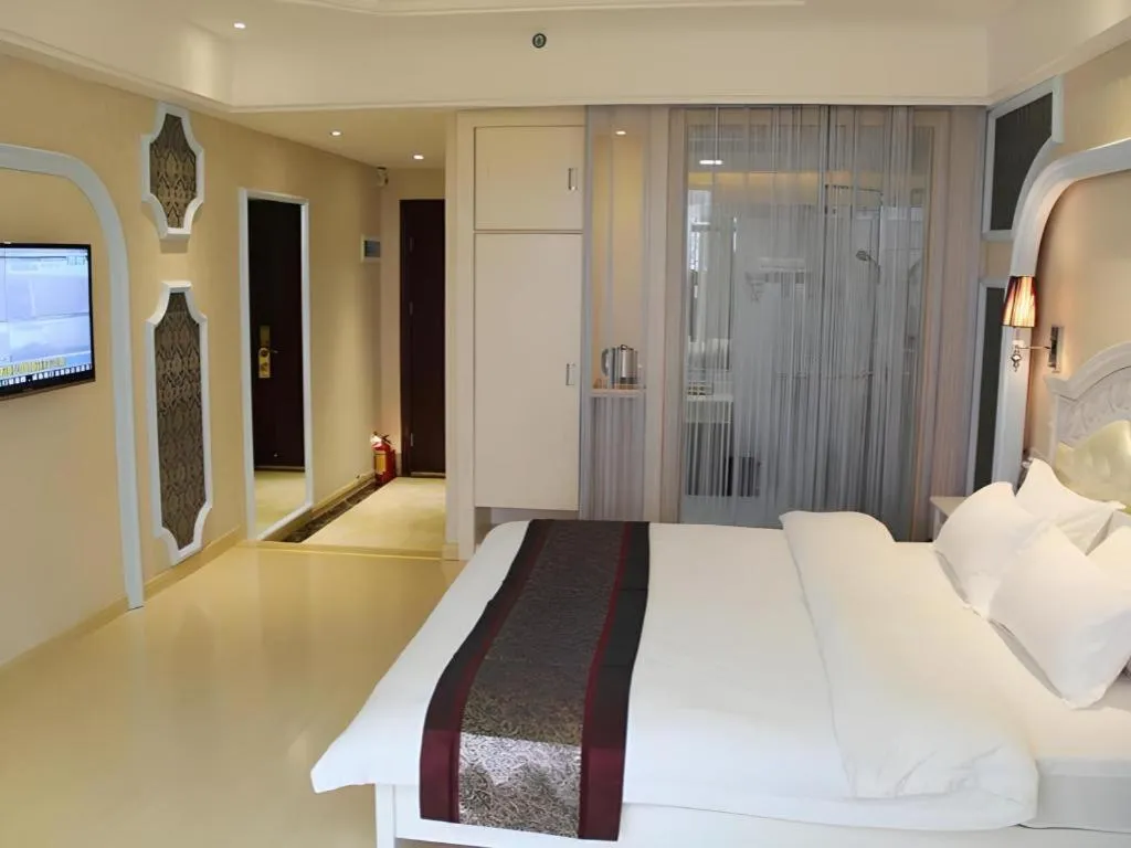 Bed in Chuanghui Business Hotel