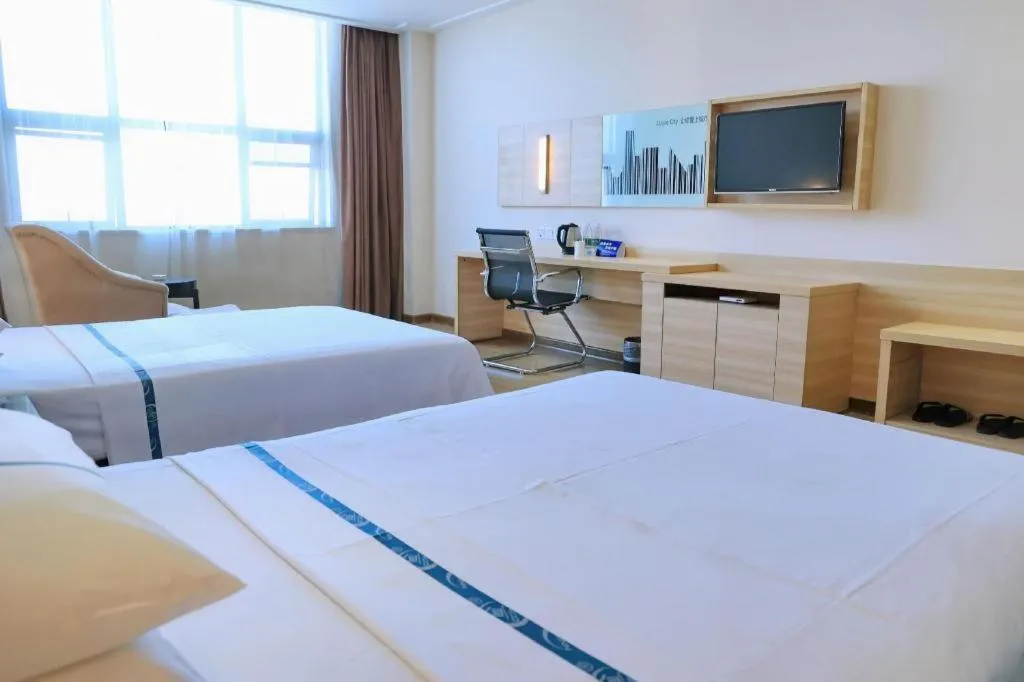 Bed in City Comfort Inn Jingzhou Ancient City Taiyue Road