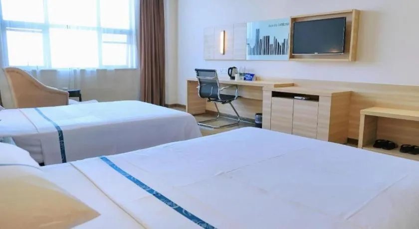 Bed in City Comfort Inn Jingzhou Ancient City Taiyue Road