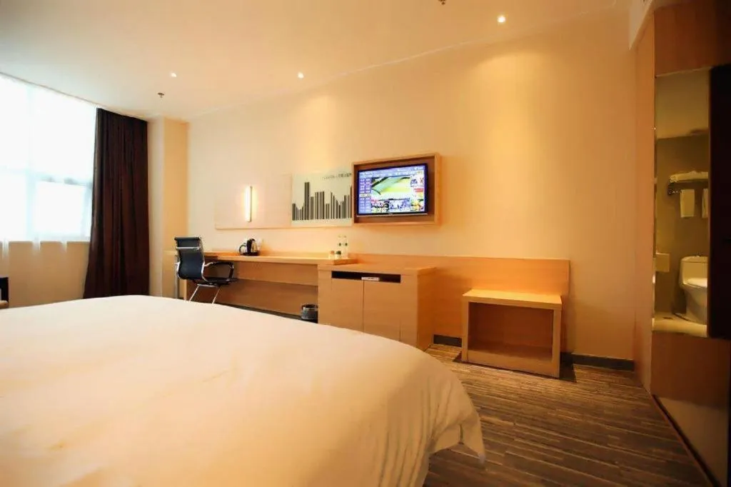 Bed in City Comfort Inn Jingzhou Ancient City Taiyue Road
