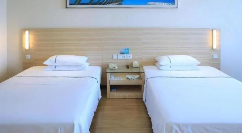 Bed in City Comfort Inn Jingzhou Ancient City Taiyue Road
