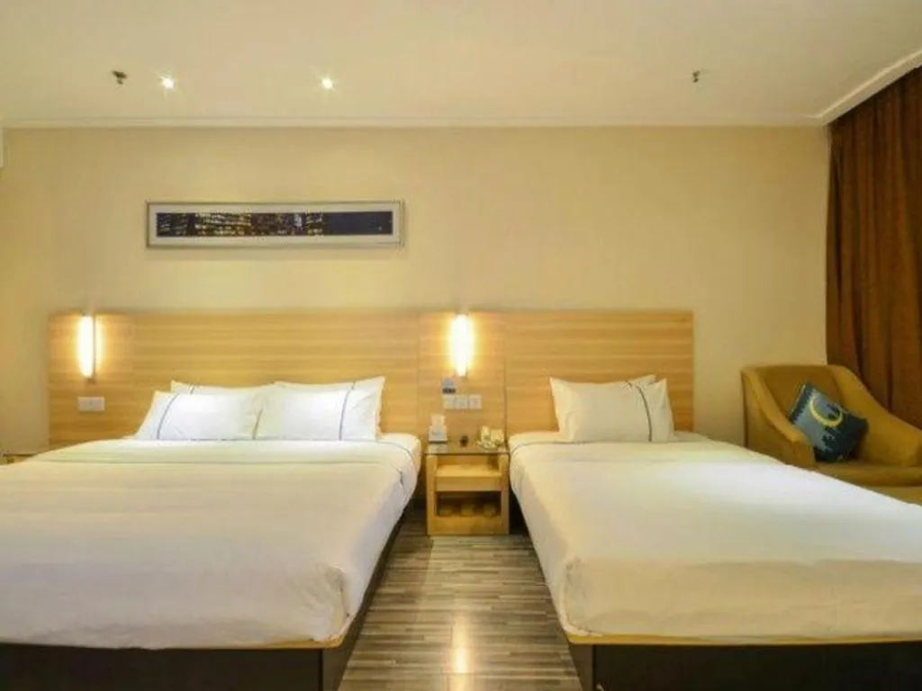 Bed in City Comfort Inn Jingzhou Ancient City Taiyue Road