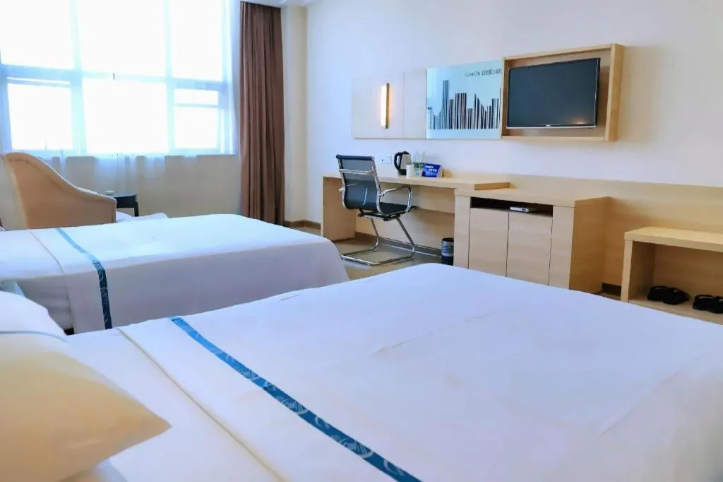 Bed in City Comfort Inn Jingzhou Ancient City Taiyue Road