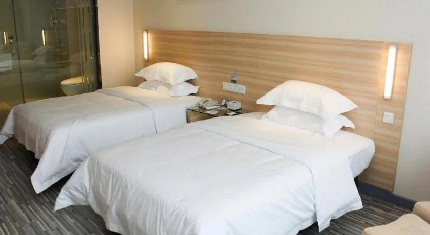 Bed in City Comfort Inn Jingzhou Ancient City Taiyue Road