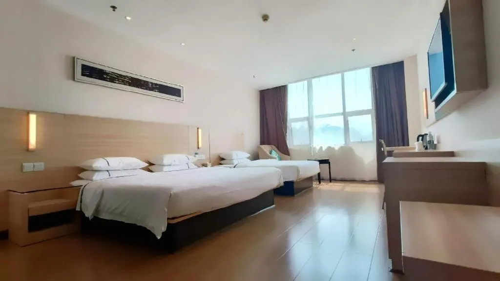 Bed in City Comfort Inn Jingzhou Ancient City Taiyue Road